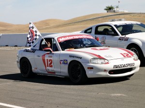 Victory lap with checkered flag