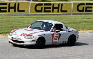 Drove so fast in qualifying that my windshield banner flew off.  Photo by Mike Clemens